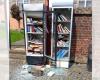 Vandals destroy the exchange library on Schendelbekeplein and burn books